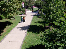Students Walking Campus Summer Drone